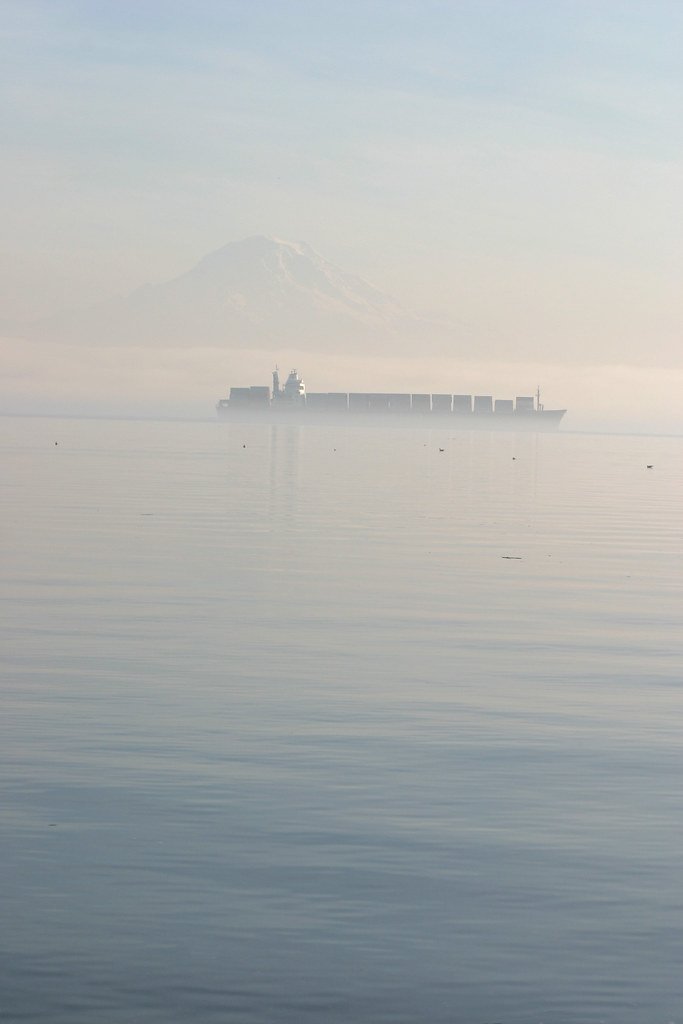 Cargo ship with Mount Rainier in the background